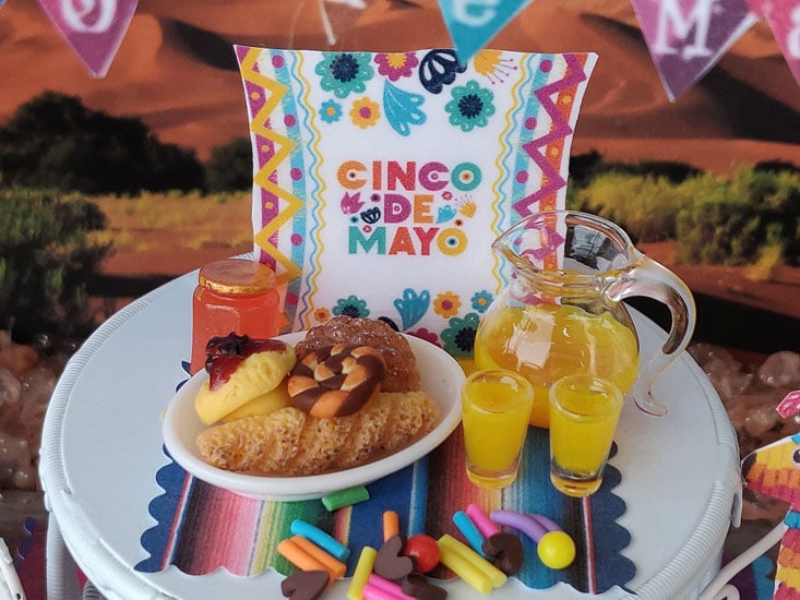 cinco de mayo breakfast with pastries and orange juice