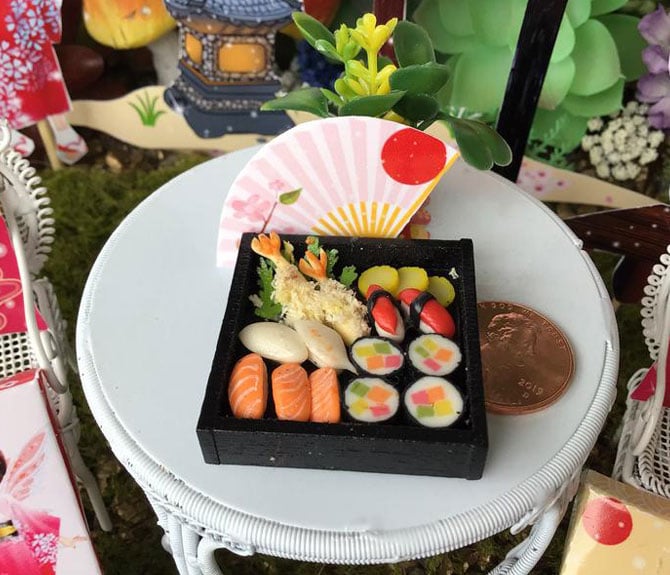 iaada international fairy's sushi in a black bento box and pink fan, miniature sushi