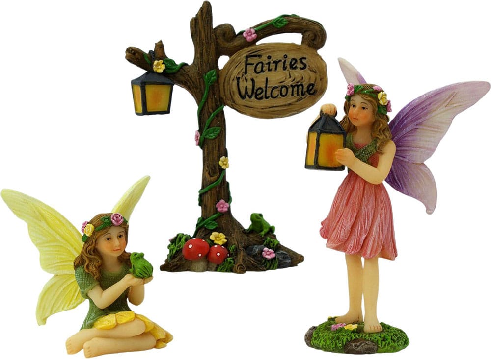 6 cute fairy garden figurines and a fairy sign