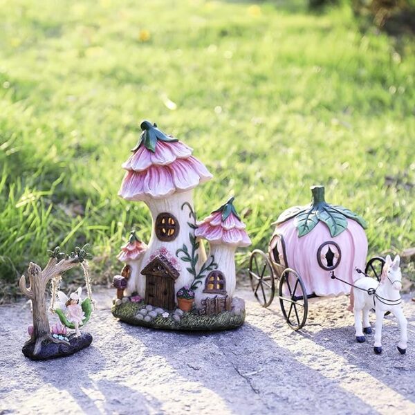 resin fairy garden miniature floral roof cottage with solar led lights, carriage, horse, & fairy in a swing