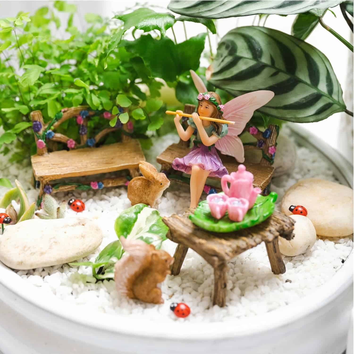 adorable figurine with furniture, squirrel, bunny & tea set